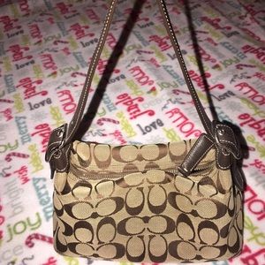 Original coach purse. Willing to take best offer .